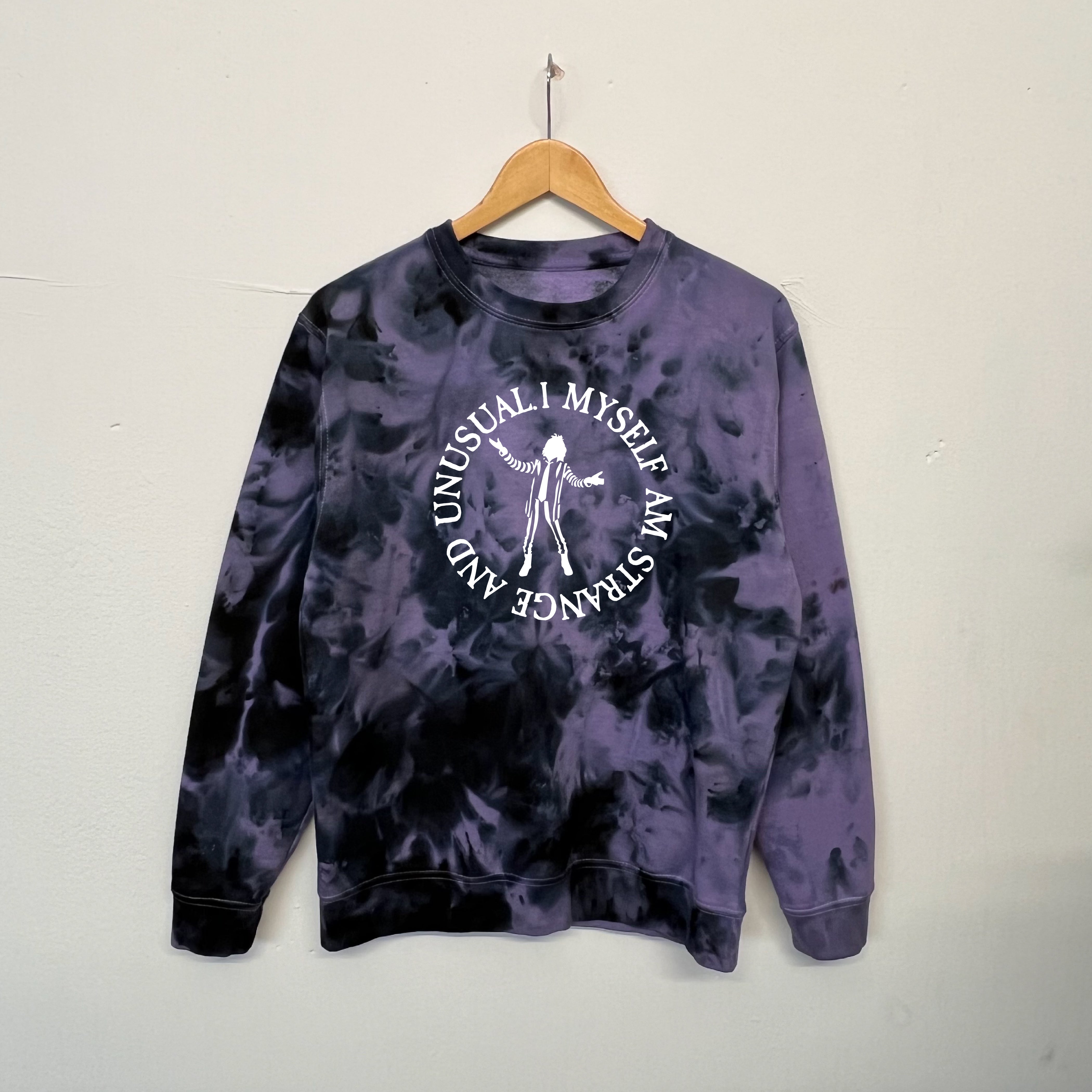 STRANGE AND UNUSUAL TIE DYE